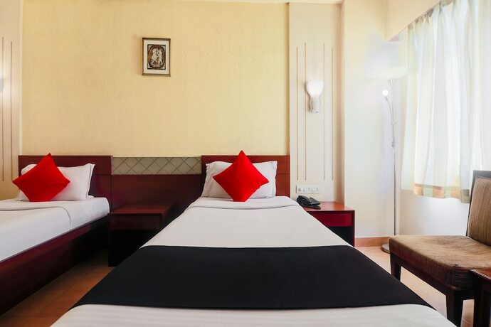 Imagen de la habitación del Hotel Oyo 2921 Nakshatra. Foto 2