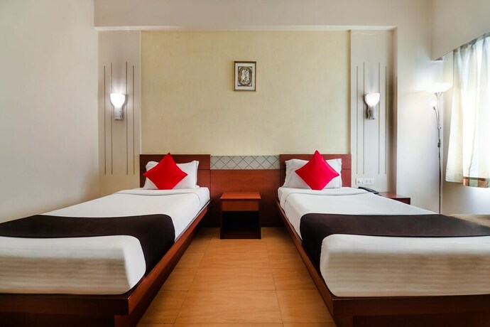 Imagen de la habitación del Hotel Oyo 2921 Nakshatra. Foto 5