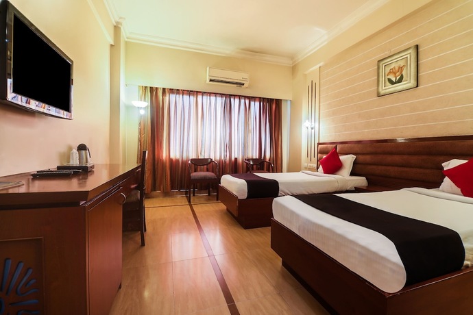 Imagen de la habitación del Hotel Oyo 2921 Nakshatra. Foto 6