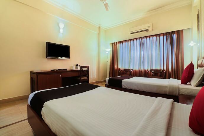 Imagen de la habitación del Hotel Oyo 2921 Nakshatra. Foto 9