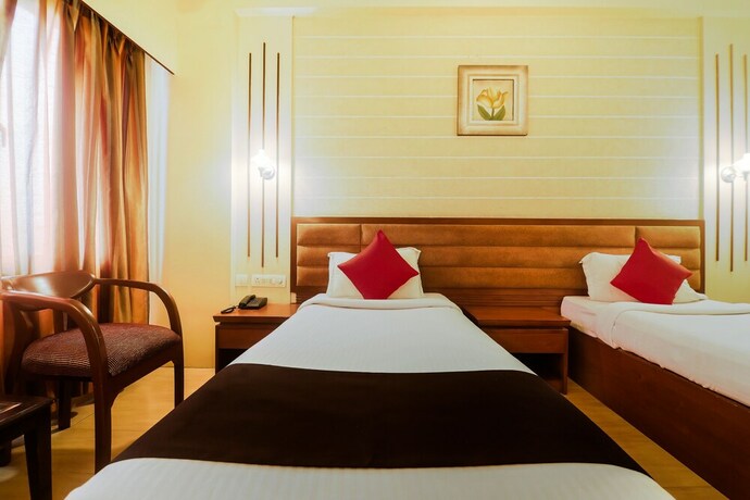 Imagen de la habitación del Hotel Oyo 2921 Nakshatra. Foto 12