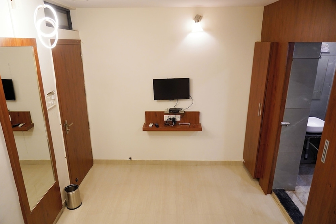 Imagen de la habitación del Hotel Oyo 2942 Suryodaya. Foto 1