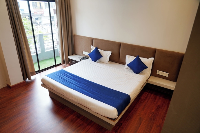 Imagen de la habitación del Hotel Oyo 2942 Suryodaya. Foto 4