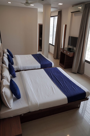 Imagen de la habitación del Hotel Oyo 2942 Suryodaya. Foto 8