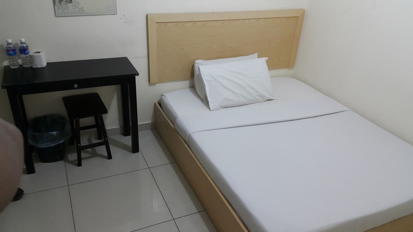 Imagen de la habitación del Hotel Oyo 301 River Inn. Foto 5