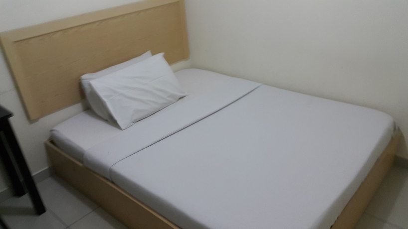 Imagen de la habitación del Hotel Oyo 301 River Inn. Foto 6