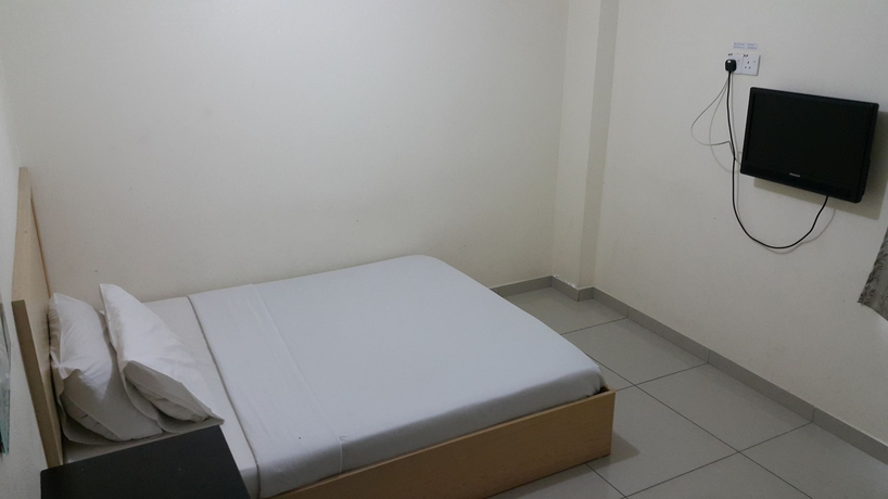 Imagen de la habitación del Hotel Oyo 301 River Inn. Foto 8