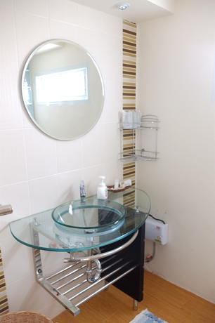 Imagen de la habitación del Hotel Oyo 304 Seven Suns Residence. Foto 3