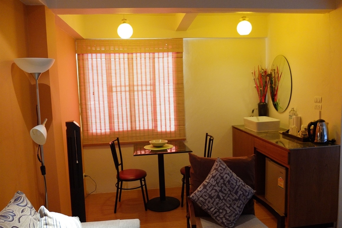 Imagen de la habitación del Hotel Oyo 304 Seven Suns Residence. Foto 4