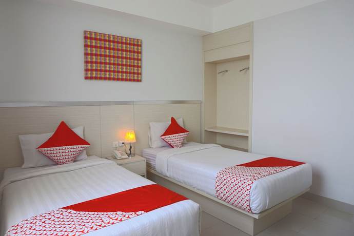 Imagen de la habitación del Hotel Oyo 3269 Grand Sayang Park Makass. Foto 2