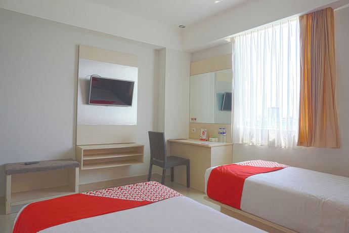 Imagen de la habitación del Hotel Oyo 3269 Grand Sayang Park Makass. Foto 4