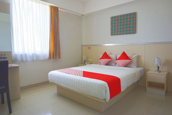 Imagen de la habitación del Hotel Oyo 3269 Grand Sayang Park Makass. Foto 7