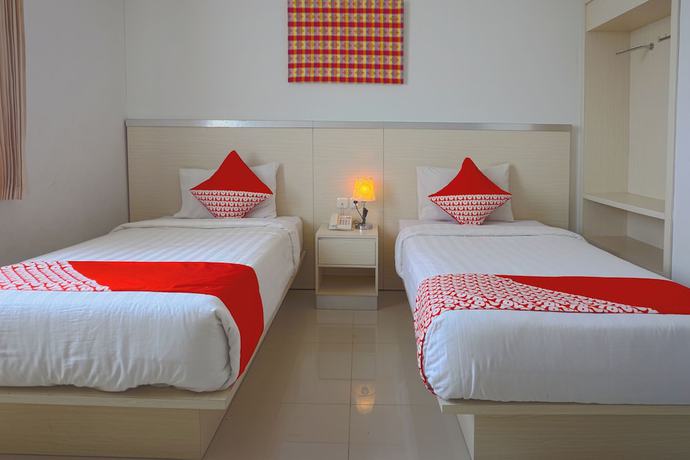 Imagen de la habitación del Hotel Oyo 3269 Grand Sayang Park Makass. Foto 9