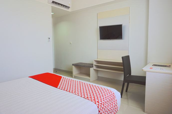 Imagen de la habitación del Hotel Oyo 3269 Grand Sayang Park Makass. Foto 10