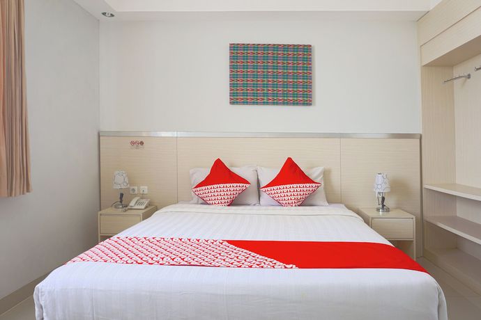 Imagen de la habitación del Hotel Oyo 3269 Grand Sayang Park Makass. Foto 11