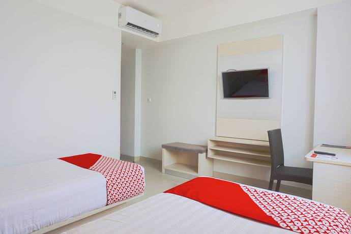 Imagen de la habitación del Hotel Oyo 3269 Grand Sayang Park Makass. Foto 13