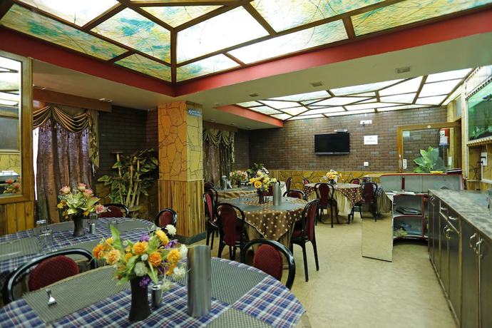 Imagen del bar/restaurante del Hotel Oyo 3616 Knight Inn Shillong. Foto 4