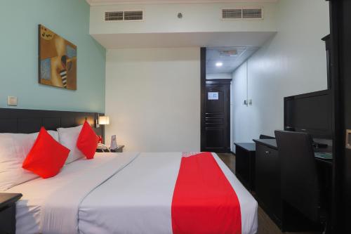 Imagen de la habitación del Hotel Oyo 367 Eureka. Foto 18