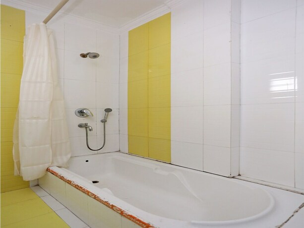 Imagen de la habitación del Hotel Oyo 3697 Rivieraa. Foto 19