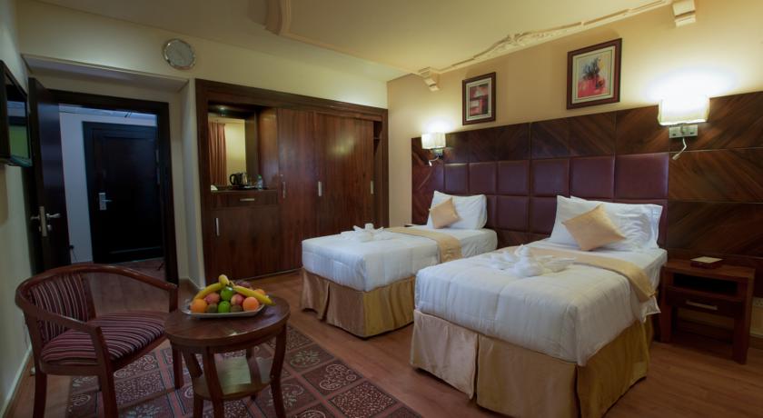 Imagen de la habitación del Hotel Oyo 372 Nawazi Watheer. Foto 7