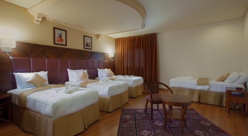 Imagen de la habitación del Hotel Oyo 372 Nawazi Watheer. Foto 8