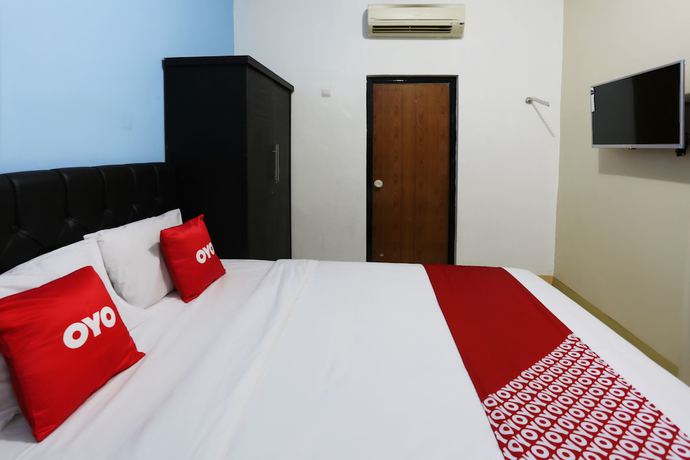 Imagen de la habitación del Hotel Oyo 3865 Wisma Niaga. Foto 1