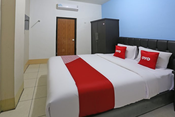 Imagen de la habitación del Hotel Oyo 3865 Wisma Niaga. Foto 2