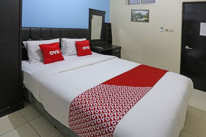 Imagen de la habitación del Hotel Oyo 3865 Wisma Niaga. Foto 4