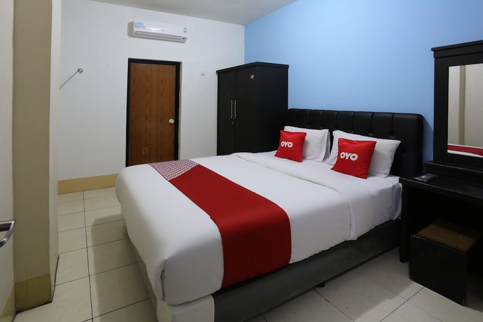 Imagen de la habitación del Hotel Oyo 3865 Wisma Niaga. Foto 6