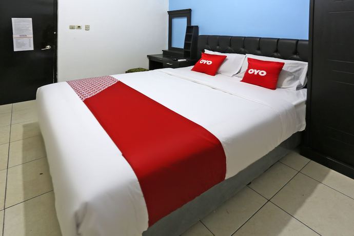 Imagen de la habitación del Hotel Oyo 3865 Wisma Niaga. Foto 9