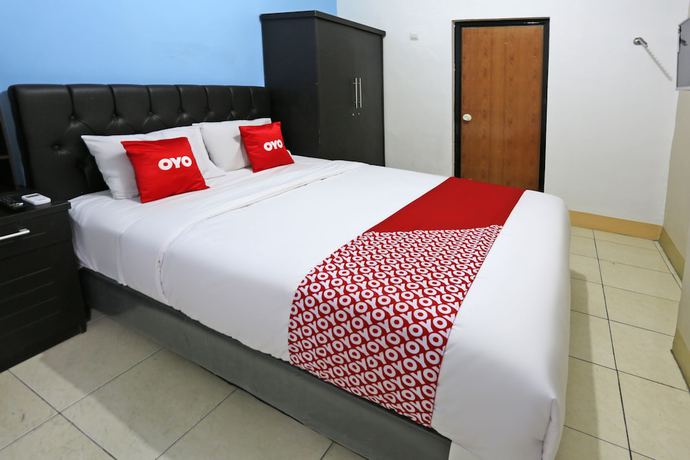Imagen de la habitación del Hotel Oyo 3865 Wisma Niaga. Foto 10