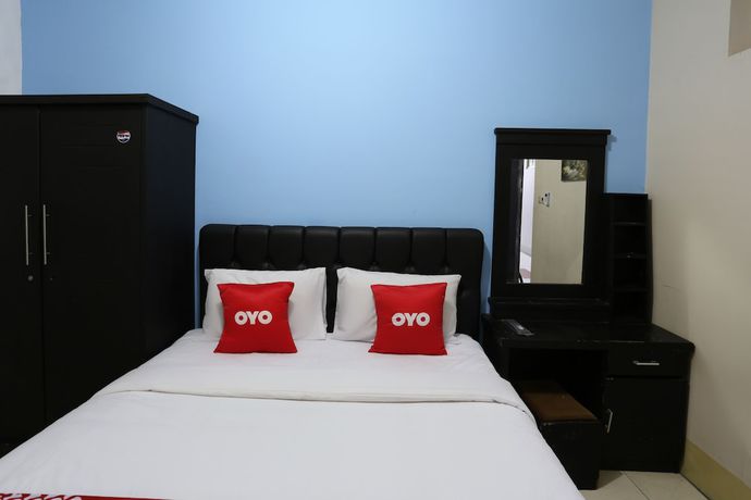 Imagen de la habitación del Hotel Oyo 3865 Wisma Niaga. Foto 11