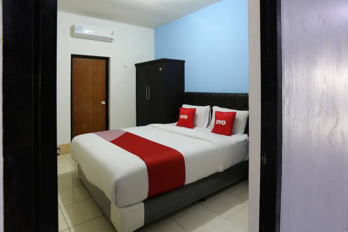 Imagen de la habitación del Hotel Oyo 3865 Wisma Niaga. Foto 13