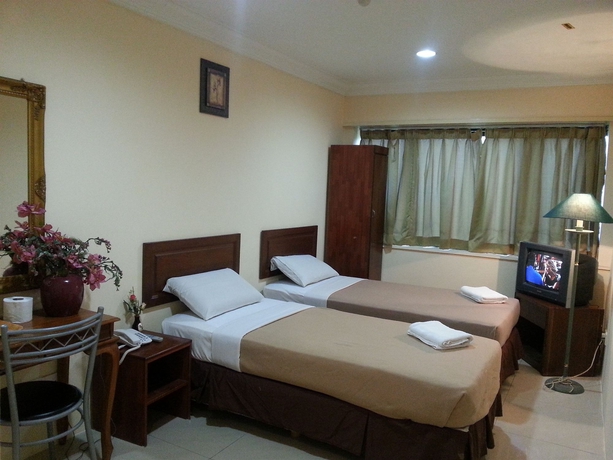 Imagen de la habitación del Hotel Oyo 390 Mayview Glory. Foto 3