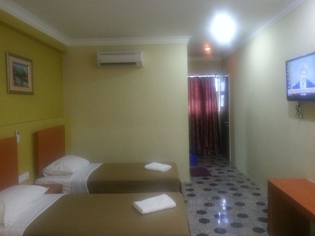 Imagen de la habitación del Hotel Oyo 390 Mayview Glory. Foto 6