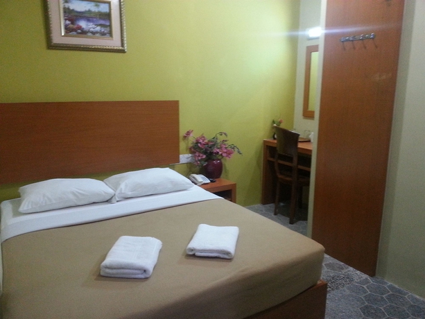 Imagen de la habitación del Hotel Oyo 390 Mayview Glory. Foto 9