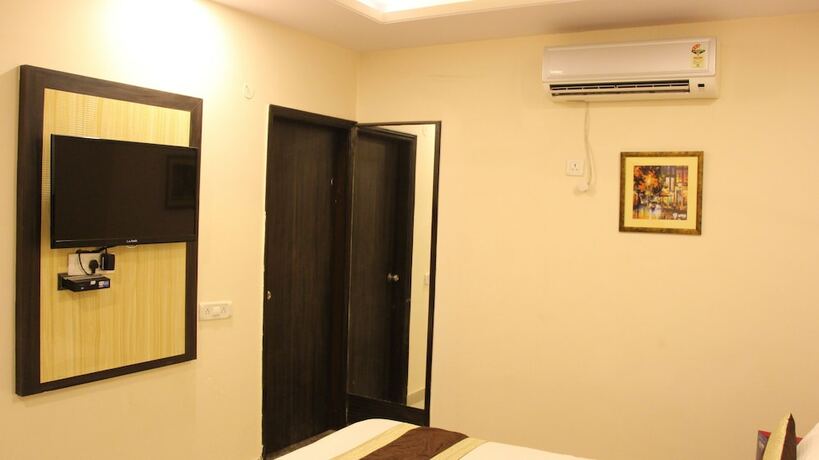 Imagen de la habitación del Hotel Oyo 3971 Tip Top. Foto 8