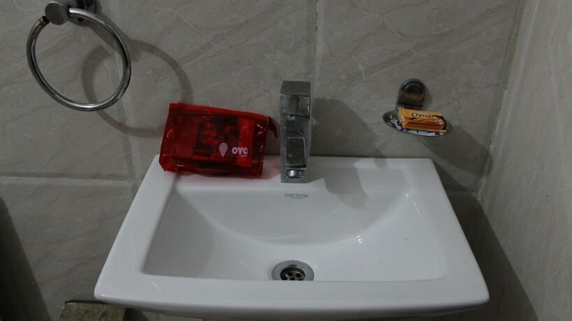 Imagen de la habitación del Hotel Oyo 3971 Tip Top. Foto 9