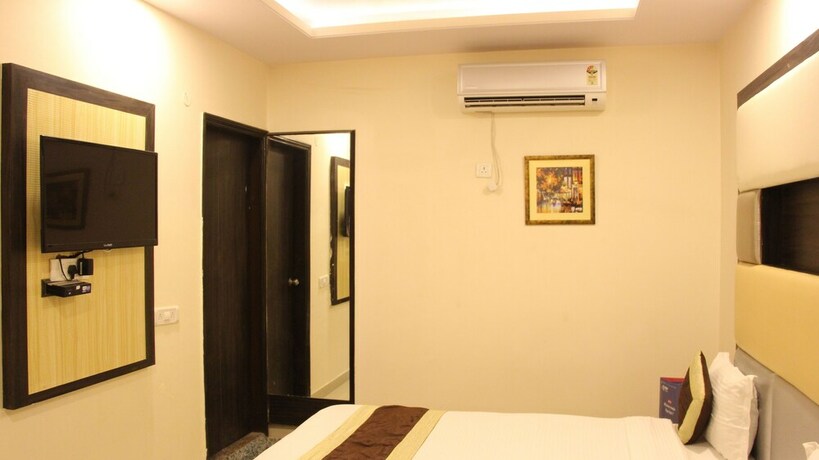 Imagen de la habitación del Hotel Oyo 3971 Tip Top. Foto 12