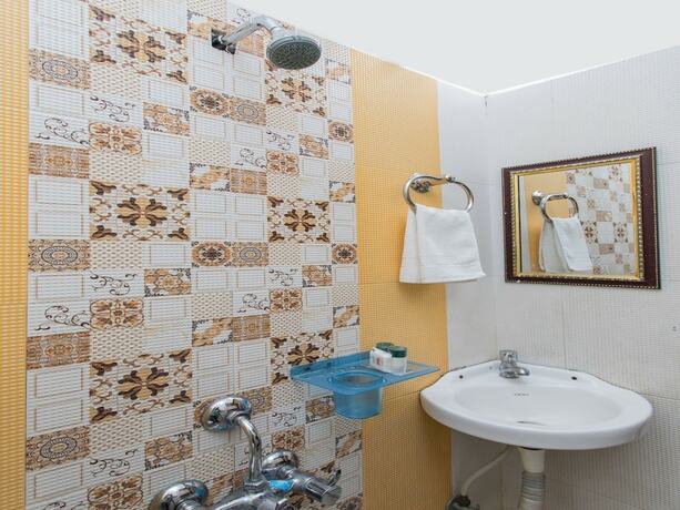 Imagen de la habitación del Hotel Oyo 4042 Mehar Residency. Foto 9