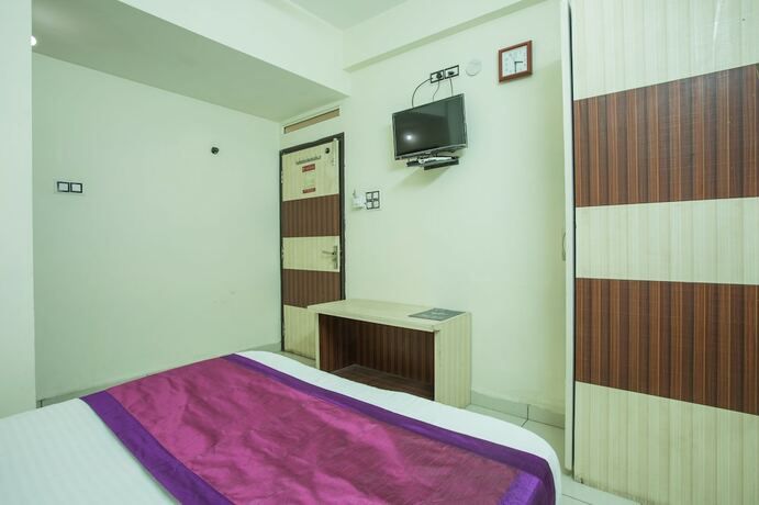Imagen de la habitación del Hotel Oyo 4042 Mehar Residency. Foto 11
