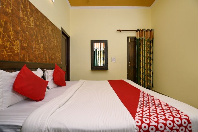 Imagen de la habitación del Hotel Oyo 4069 Morning Star. Foto 23