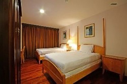 Imagen de la habitación del Hotel Oyo 430 Oak Valley Boutique. Foto 8