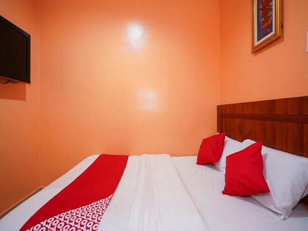 Imagen de la habitación del Hotel Oyo 43967 Bercam Times Inn. Foto 2