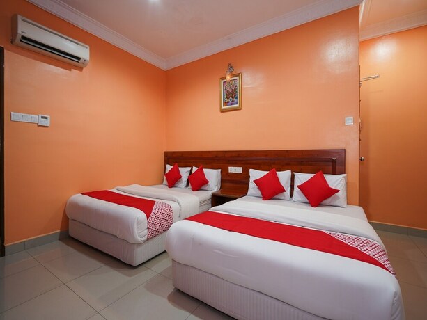 Imagen de la habitación del Hotel Oyo 43967 Bercam Times Inn. Foto 4