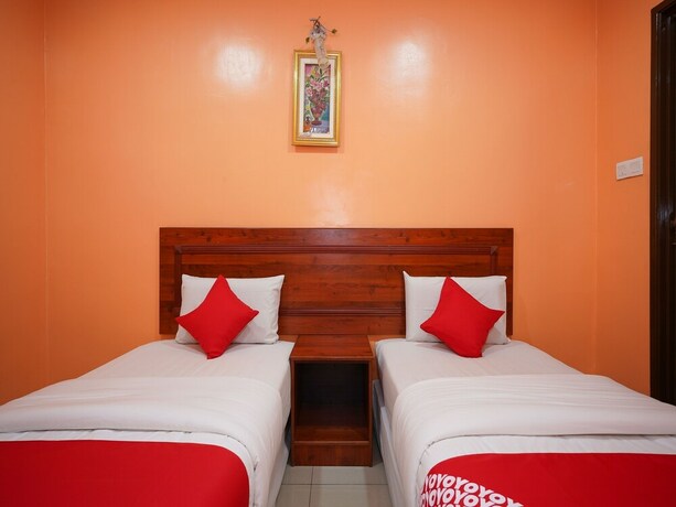 Imagen de la habitación del Hotel Oyo 43967 Bercam Times Inn. Foto 11