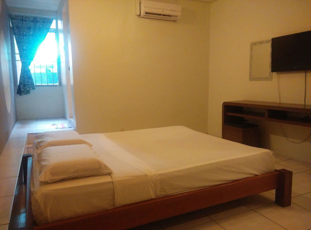 Imagen de la habitación del Hotel Oyo 44034 Furama Lodging House. Foto 2