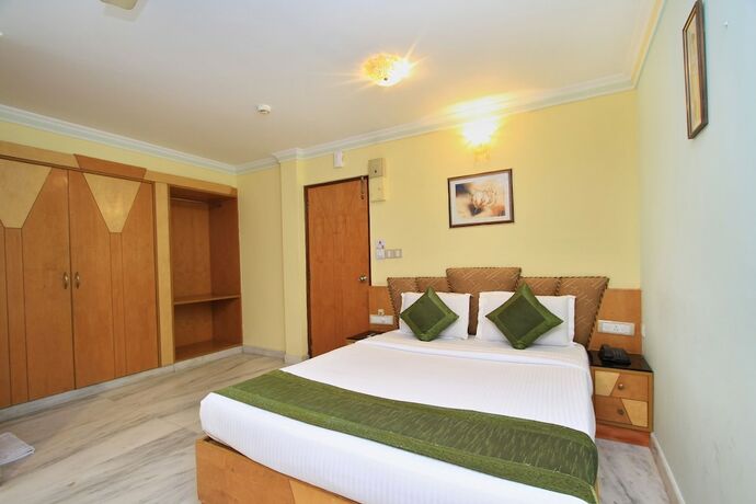 Imagen de la habitación del Hotel Oyo 4531 Pleasant Stay Inn. Foto 4