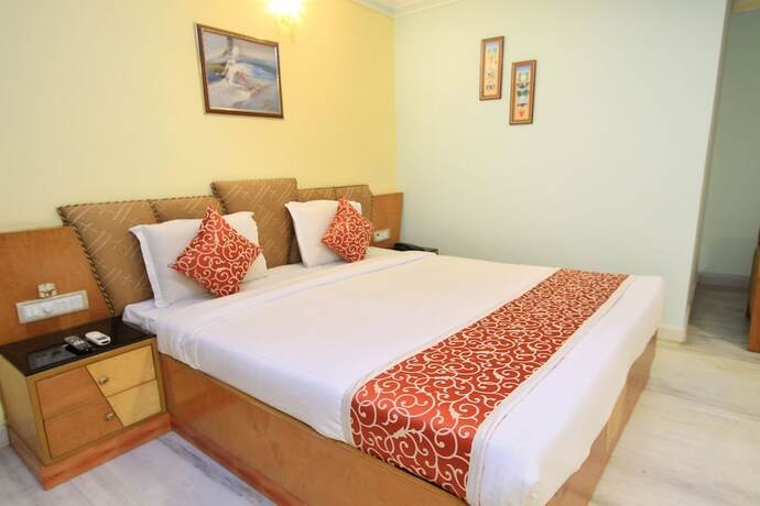 Imagen de la habitación del Hotel Oyo 4531 Pleasant Stay Inn. Foto 14