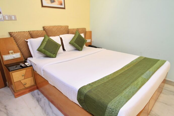 Imagen de la habitación del Hotel Oyo 4531 Pleasant Stay Inn. Foto 16